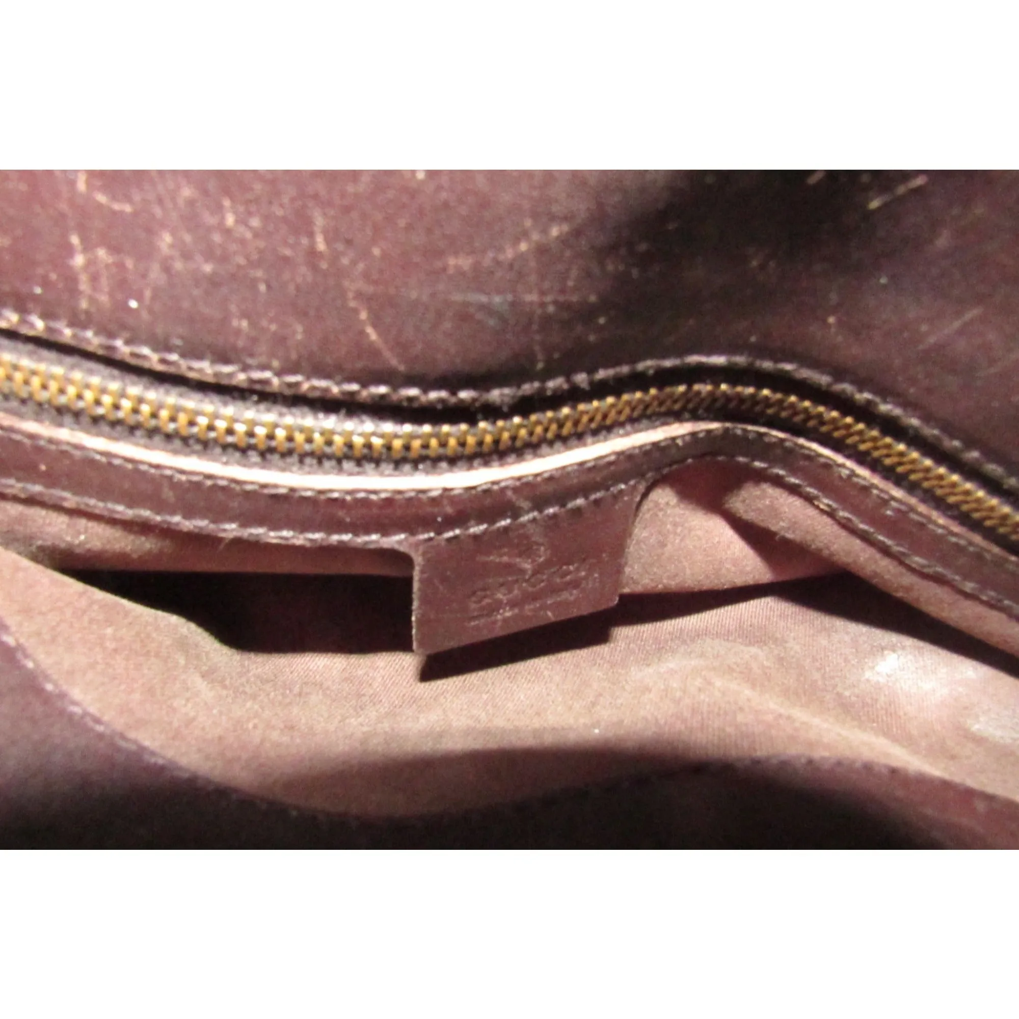 Gucci brown Guccissima print canvas & leather strappy cylindrical tote with brass accents