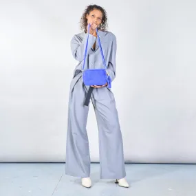 Suede crossbody bags with tassel detail wholesale