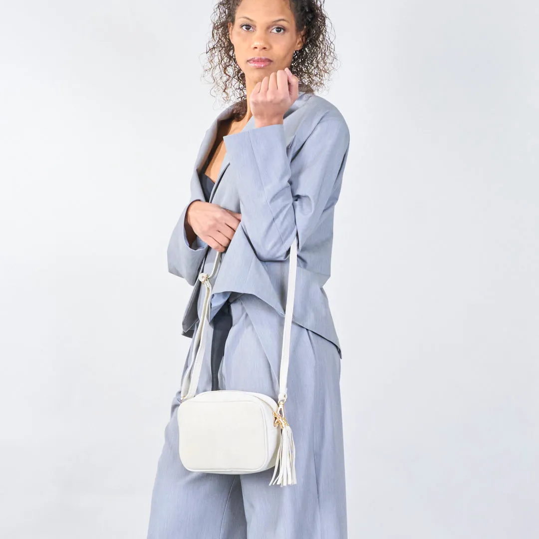 Suede crossbody bags with tassel detail wholesale