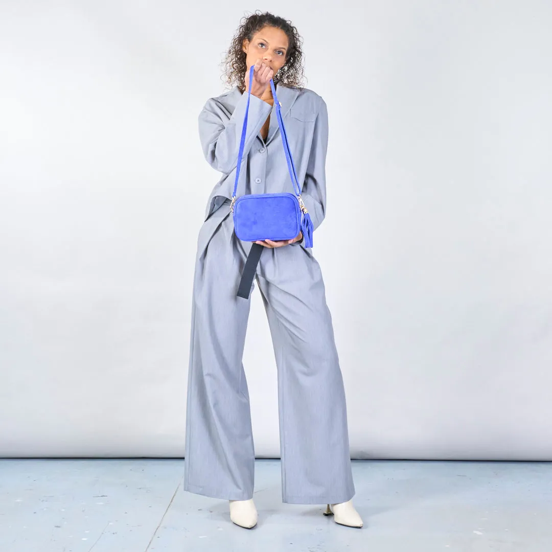 Suede crossbody bags with tassel detail wholesale